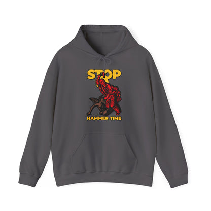 Gray hoodie with St Marina of Antioch beating the devil, "STOP HAMMER TIME" in yellow text, red/blue/yellow design. Modern Orthodox meme, inspired by legendary saints.