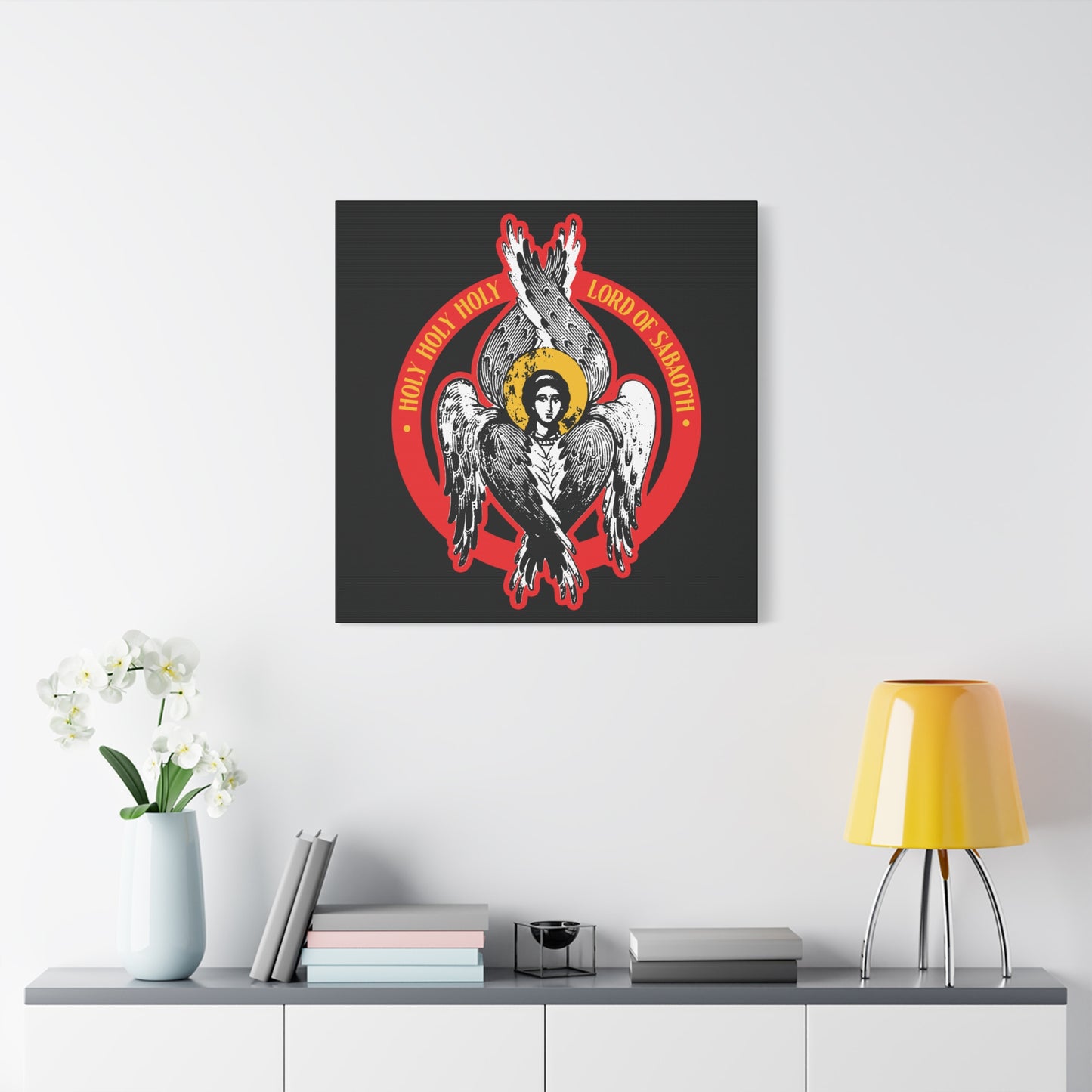 Modern living room featuring the "Holy Holy Holy, Lord of Sabaoth | Isaiah 6 | Orthodox Seraphim Angel IconoGraphic" Christian wall art above a sideboard with a lamp and flowers.