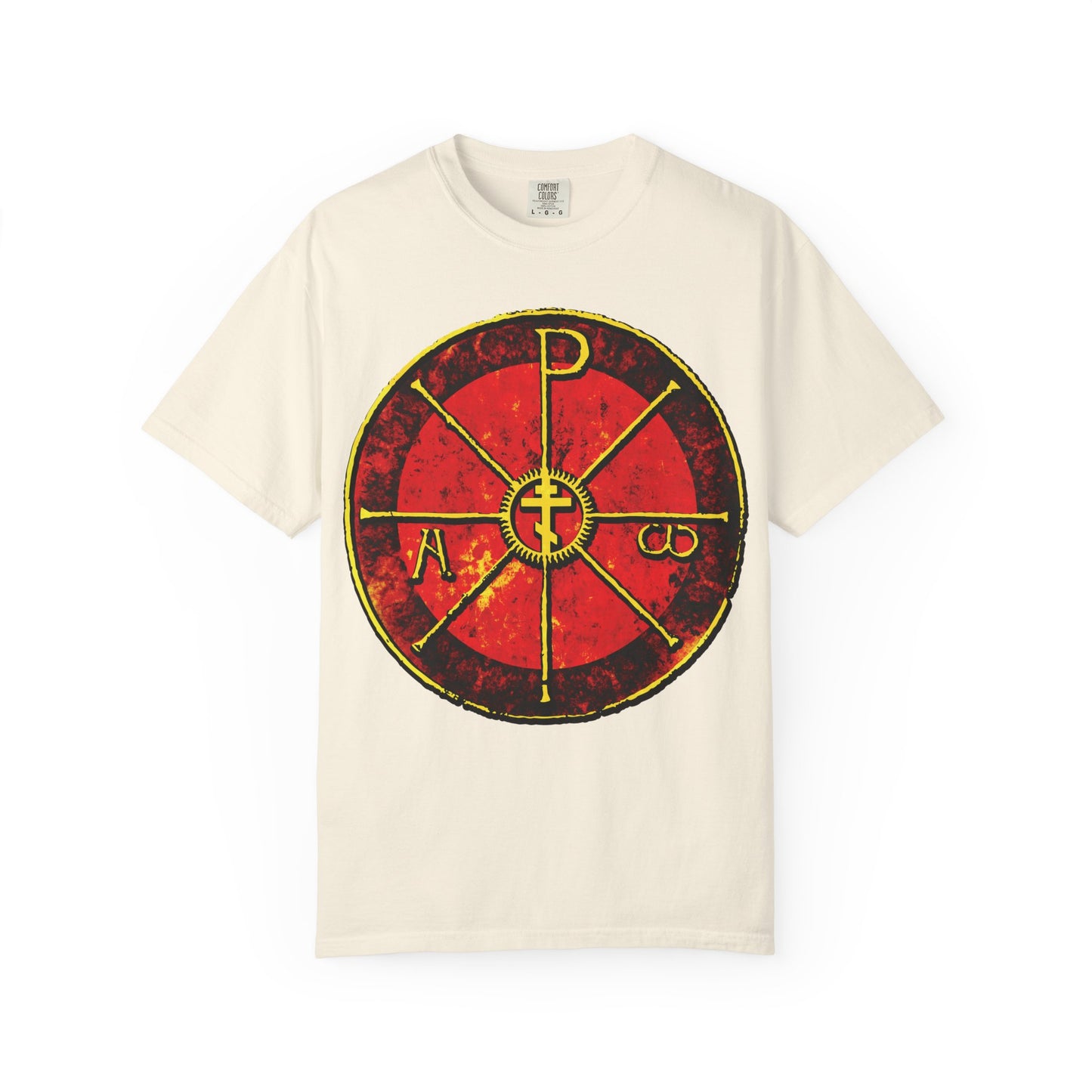Ivory t-shirt featuring a large red and yellow Chi Rho cross with Greek letters, inspired by the ancient Christogram of Saint Ambrose at Milan’s Duomo. Alpha & Omega Orthodox Cross design, heavyweight cotton: "In This Sign Ye Shall Conquer".