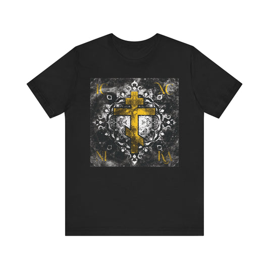 Gold ICXC NIKA Orthodox Cross on a grayscale ornate floral texture background, featured on an Orthodox Christian lightweight cotton unisex tee.