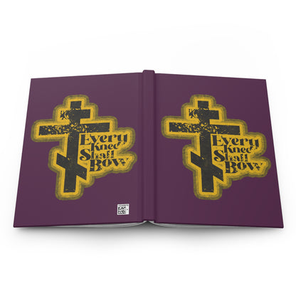A purple blank journal with yellow Orthodox crosses and "Every Knee Shall Bow," inspired by Philippians 2:10-11 and Isaiah 45:23, in a 70s distressed halftone comic book aesthetic on front and back covers.