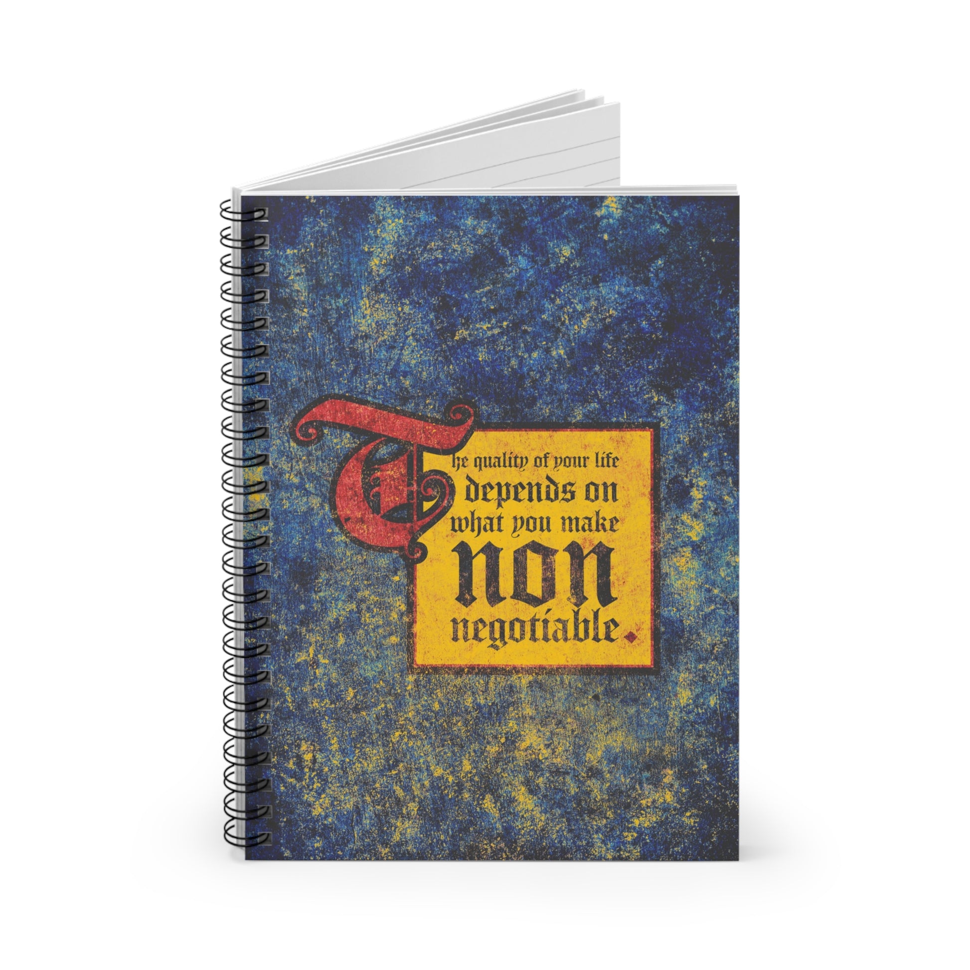 The Quality of Your Life Depends on What You Make Non-Negotiable spiral notebook features a textured blue cover and a medieval-style Christian motivational quote: “Uncompromising Christianity. The Quality of Your Life Depends on What You Make Non-Negotiable.”.