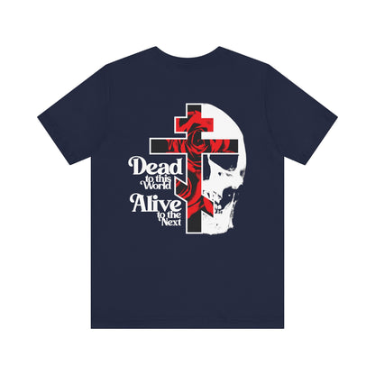 Navy unisex tee with a white cross on the front left chest; back features skull, cross, red rose art, and “Dead to This World, Alive to the Next.” Lightweight cotton. Goth aesthetic.