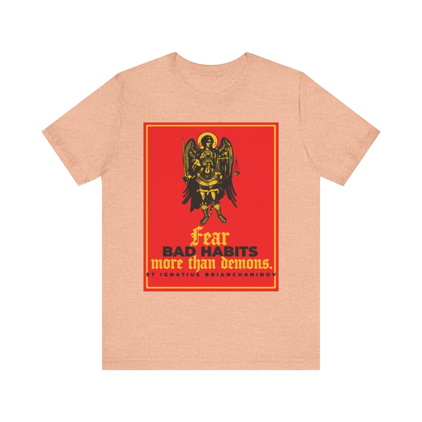 Heather Peach unisex cotton tee featuring Archangel Michael icon and the quote: "Fear bad habits more than demons" by St Ignatius Brianchaninov—a reminder that our actions shape us in spiritual battles.