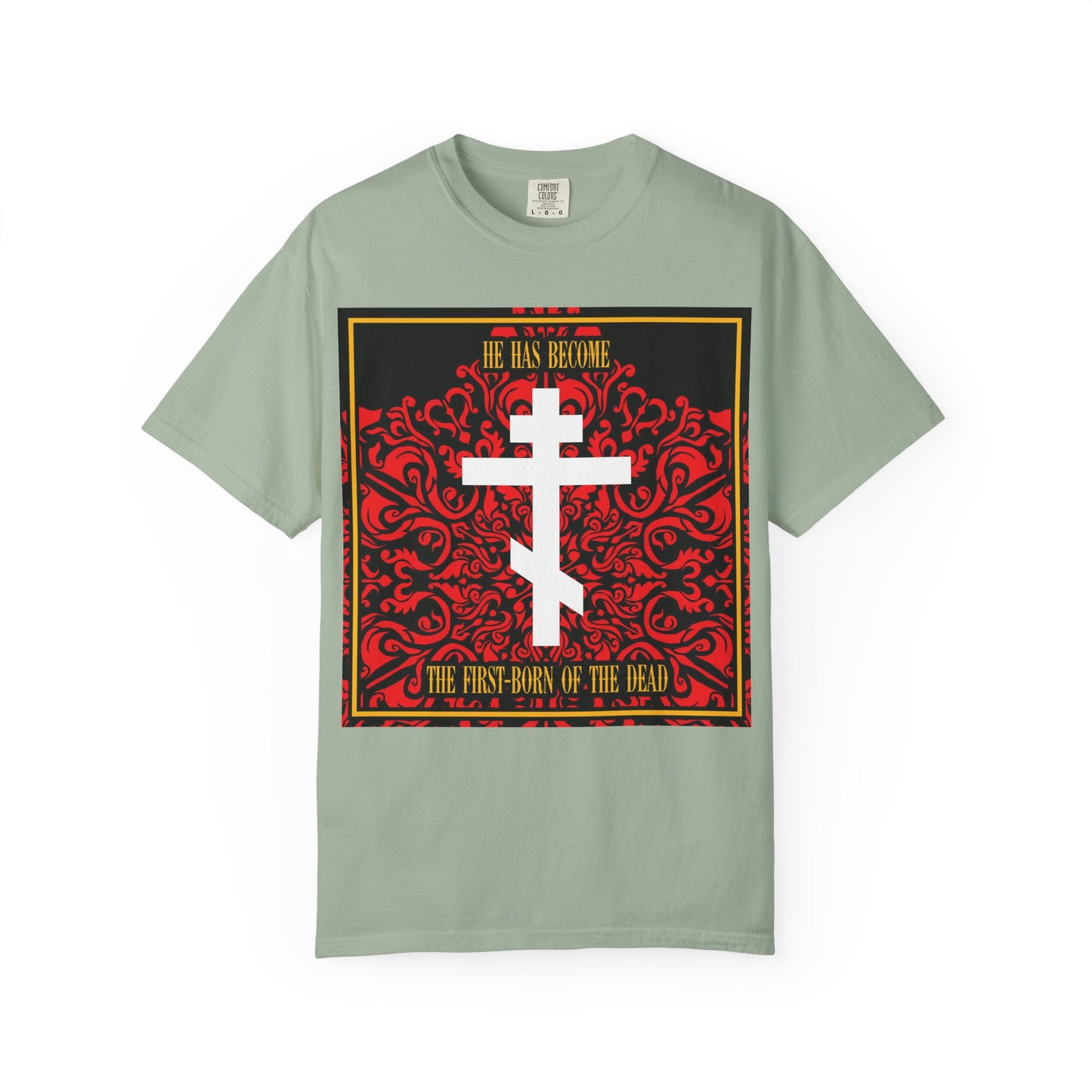 Bay unisex heavyweight cotton tee featuring a red floral textured design with a white Orthodox cross and ornate patterns—a distinctive Christian t-shirt perfect for expressing your faith; product name: "He Has Become the First-Born of the Dead.