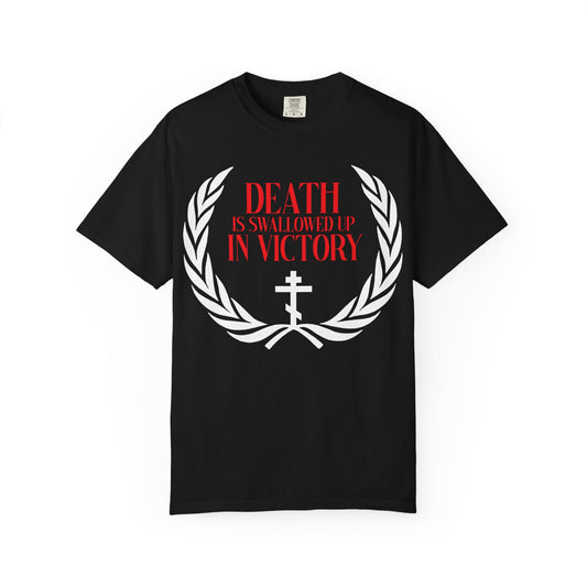 Black heavyweight cotton t-shirt featuring a white Orthodox cross, a victory wreath, and red “Death is Swallowed Up In Victory” text (1 Cor 15:54), symbolizing immortality.