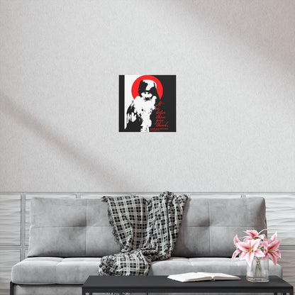 A modern living room with a gray couch, plaid throw, and black coffee table, perfect for reading Orthodox texts, features Remembrance of Death "It's Later Than You Think | Fr Seraphim Rose" black, white, and red Christian art poster on the wall.