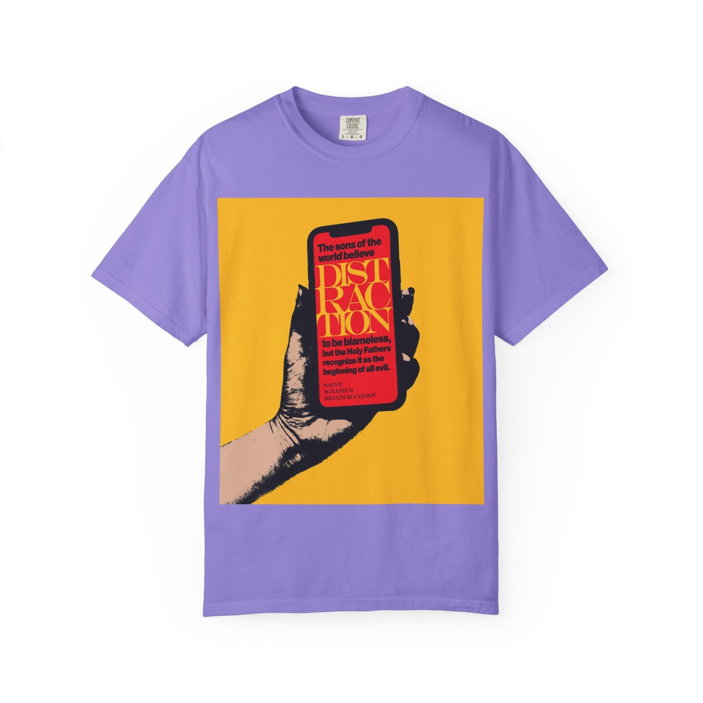 Violet “Distraction is the Beginning of All Evil (St Ignatius Brianchaninov)” heavyweight cotton unisex tee featuring a yellow square; design shows a hand holding a phone with red “DISTRACTION” text and a quote from St. Ignatius Brianchaninov, conveying Orthodox Christian wisdom and insights from The Field.