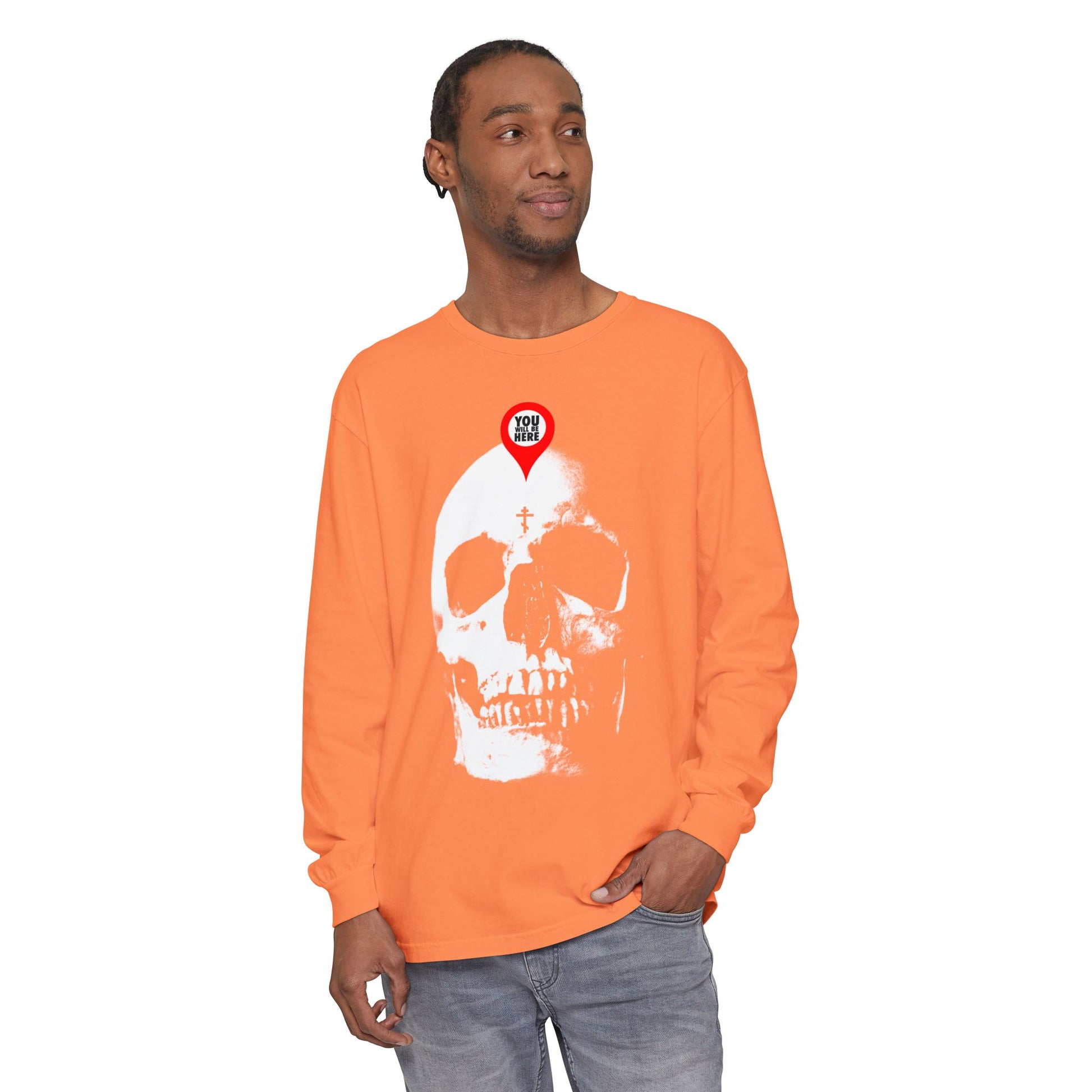 Man in orange Orthodox long sleeve with "You Will Be Here Maps Marker on Skull" design, featuring "What You Are I Once Was" and "Memento Mori"—a striking reminder of mortality and remembrance.