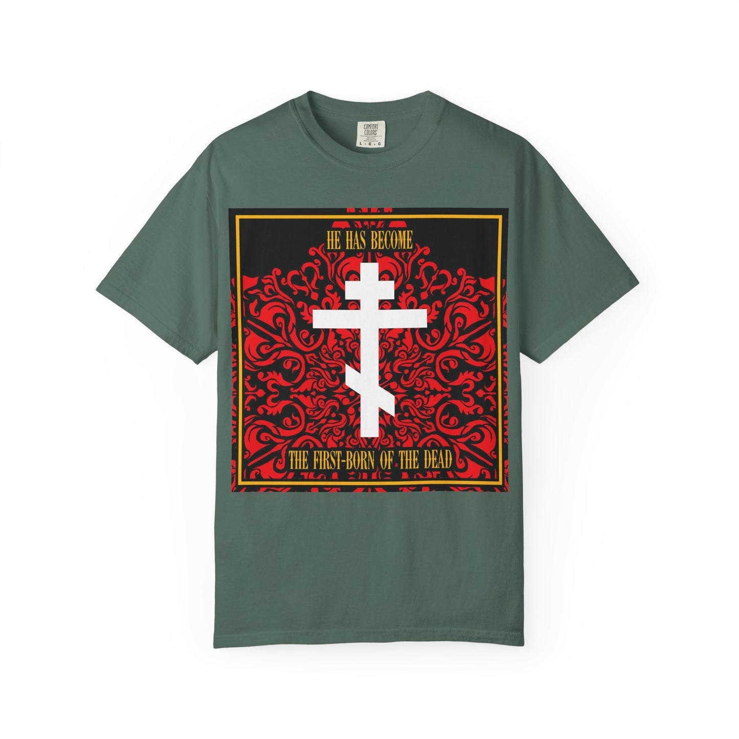 Blue spruce unisex heavyweight cotton tee featuring a white Orthodox cross on a red floral texture and the text: He Has Become the First-Born of the Dead—a bold Christian t-shirt inspired by scripture, perfect for everyday wear.