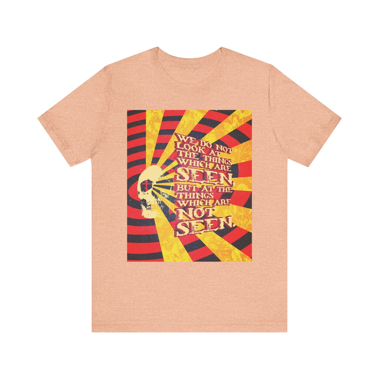 Heather peach t-shirt in a lightweight cotton blend, featuring a bold graphic inspired by giallo horror movie posters—a striking skull and the quote "We look at things which are not seen," from 2 Corinthians 4:18—designed to remind you to focus on spiritual riches and everlasting life.