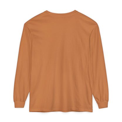 Back view of the Orthodox Long Sleeve Shirt in orange-brown, featuring a crew neck and ribbed cuffs, inspired by Gal 6:14: "May I never boast, except in the cross of our Lord Jesus Christ" and the White Orthodox Cross.