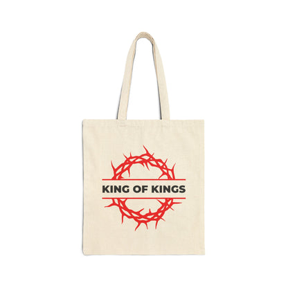 The King of Kings Crown of Thorns Christian cotton canvas tote bag features a red crown of thorns and “KING OF KINGS” text, inspired by Revelation 19:16 and proclaiming Christ as King of Glory.