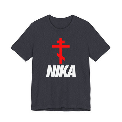 Heather navy t-shirt with an Orthodox cross above bold white NIKA text, inspired by the NIKE logo. Minimalist, athletic ascetic design—Jesus Christ Conquers. Christian apparel.
