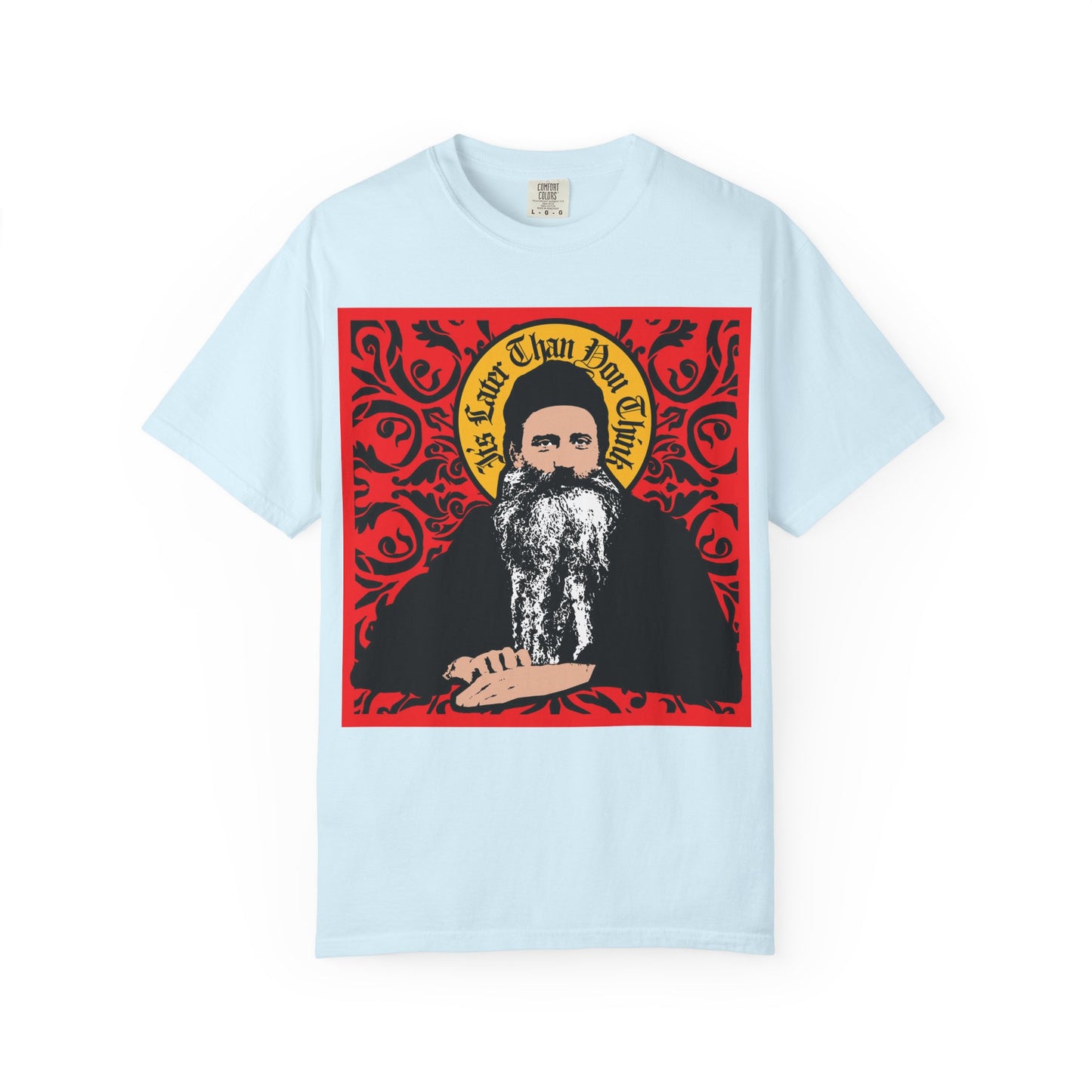 Chambray t-shirt featuring a bold red ornate graphic and the text “It’s Later Than You Think,” inspired by Saint Seraphim Rose of Platina in an icono-graphic style—crafted for Orthodox Christians and admirers of his legacy.