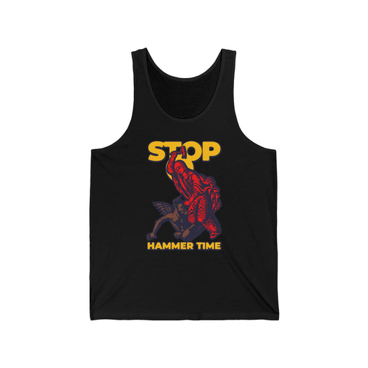 Wear the "St Marina of Antioch Beating the Devil with a Hammer" tank top—featuring bold red, blue, and yellow artwork with "STOP HAMMER TIME"—a modern Orthodox meme celebrating resilience and faith in playful style.