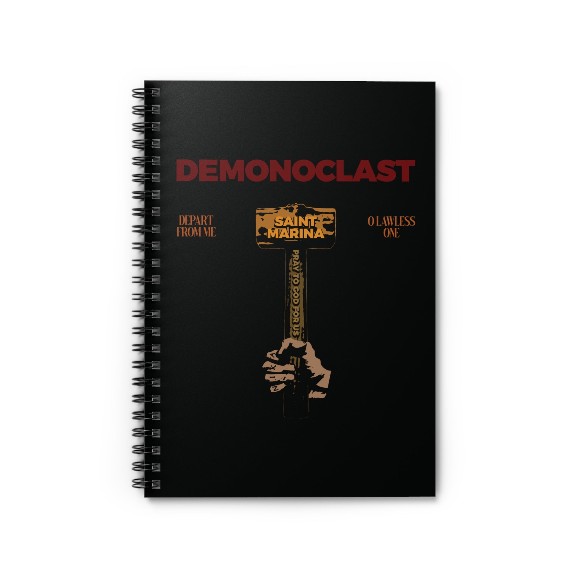 Black spiral notebook featuring "Demonoclast | St. Marina's Hammer | NIKA Fist | Christ Conquers | Demon Smasher | Unseen Warfare | Christian Martyrdom" design with a hand holding a golden hammer, inspired by the Life of St. Marina.