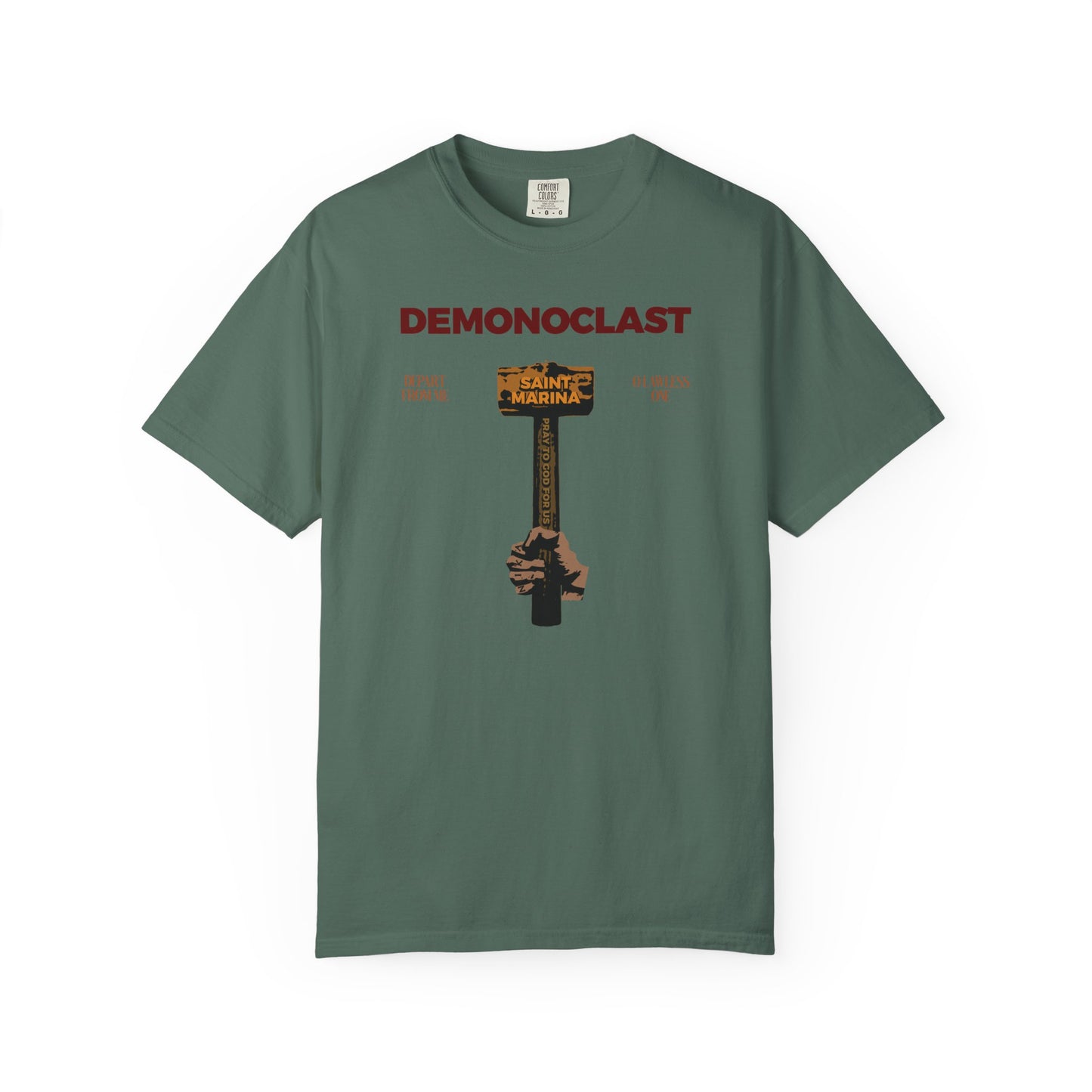 Blue Spruce heavyweight cotton tee featuring DEMONOCLAST text and an illustration of the NIKA fist holding St. Marina’s Hammer, inspired by Christ Conquers, Martyrdom, and Unseen Warfare. Orthodox unisex fit.