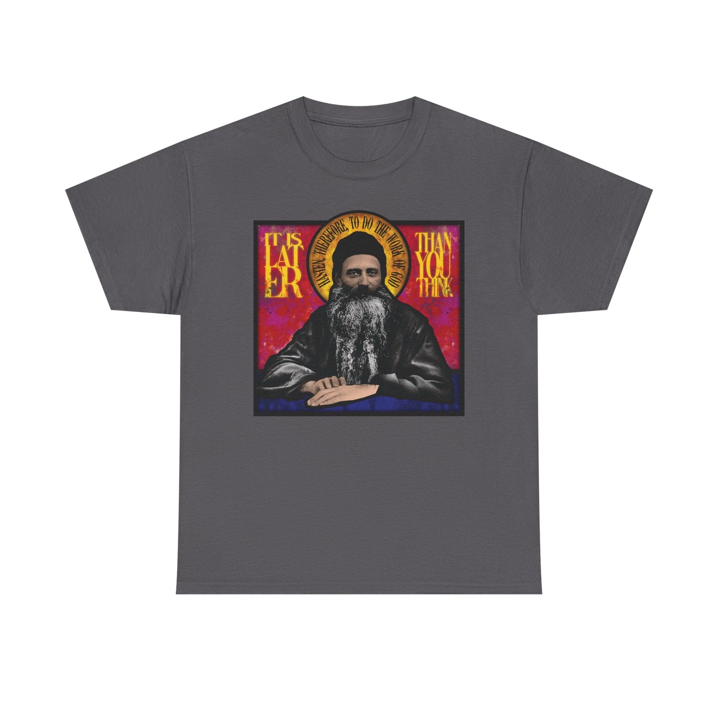 Charcoal midweight cotton unisex t-shirt featuring a stained glass design of Fr. Seraphim Rose—a revered American Orthodox monastic saint—with bold yellow "It Is Later Than You Think" text, offering a subtle reminder of salvation and the promise of the Kingdom of Heaven.
