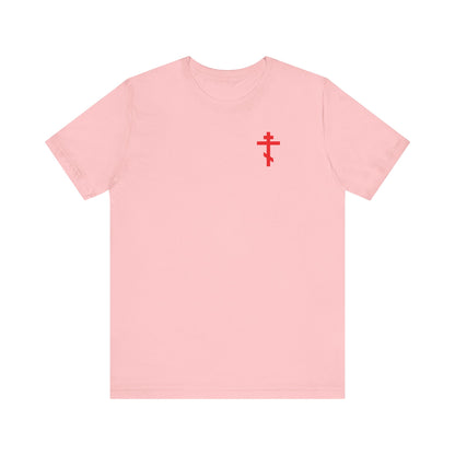 Pink unisex cotton tee featuring a red Orthodox cross on the front left chest and "Always Live In Remembrance of Death" with a crown of thorns design on the back, inspired by St John Climacus.