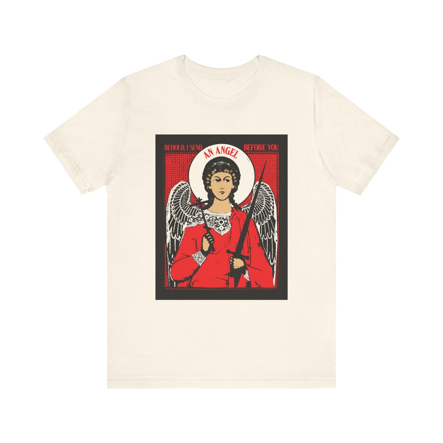 Natural cotton unisex tee featuring a guardian angel with cross and sword, plus red and black text: "BEHOLD, I SEND AN ANGEL BEFORE YOU" (Ex 23:20). Orthodox iconographic design inspired by divine protection.