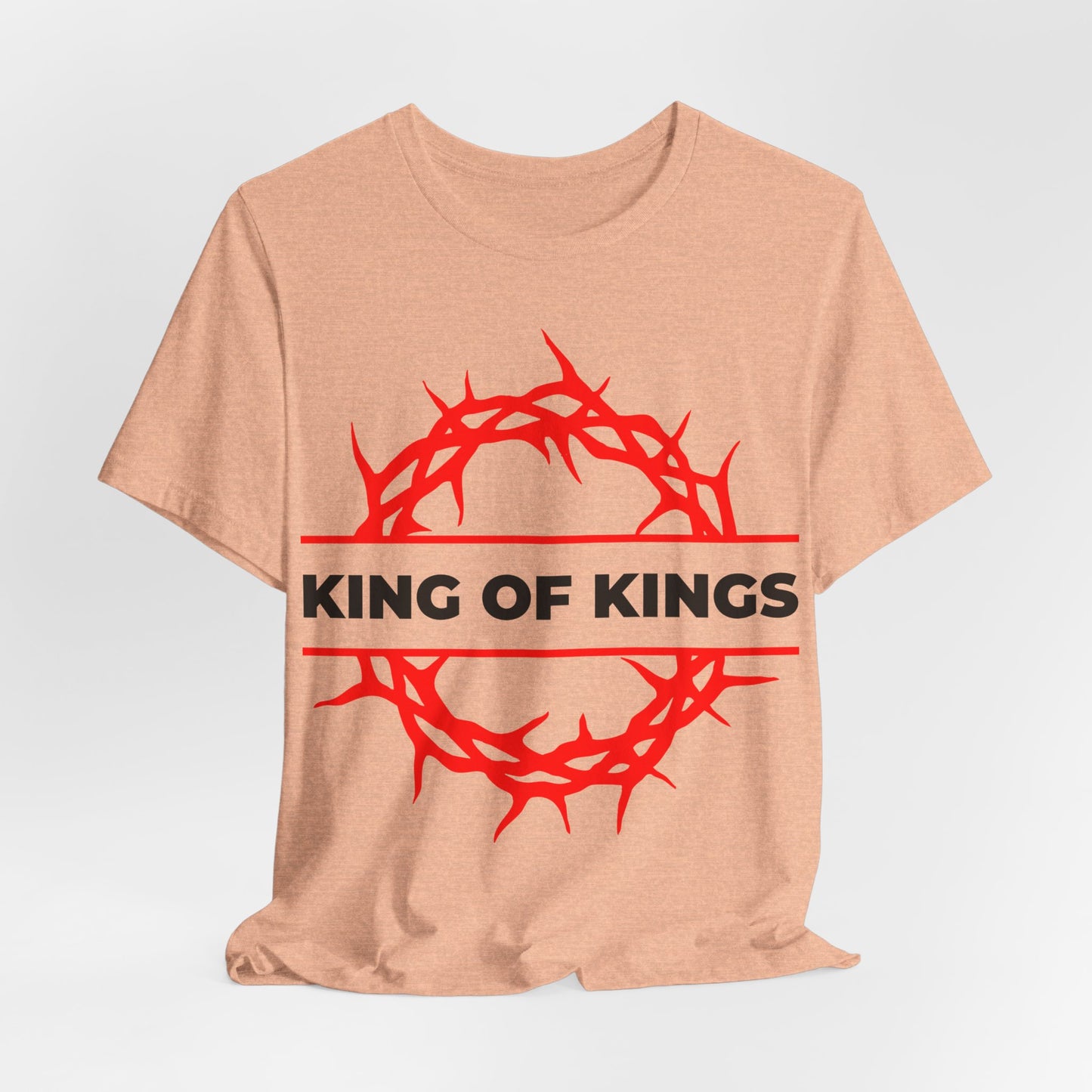 Tan unisex cotton tee featuring a red crown of thorns and bold "KING OF KINGS" text, inspired by Revelation 19:16. King of Kings Crown of Thorns | The King of Glory | Christ is King | Orthodox Christian T-shirt.