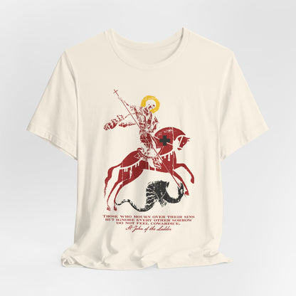 Those Who Mourn Over Their Sins | St George Slaying Dragon IconoGraphic | St John Climacus | Orthodox Christian Lightweight Cotton Unisex Tee features a cream color and a bold graphic of St. George riding a horse and slaying the dragon, with striking red and black text beneath the image—symbolizing the godly sorrow described by St John Climacus.