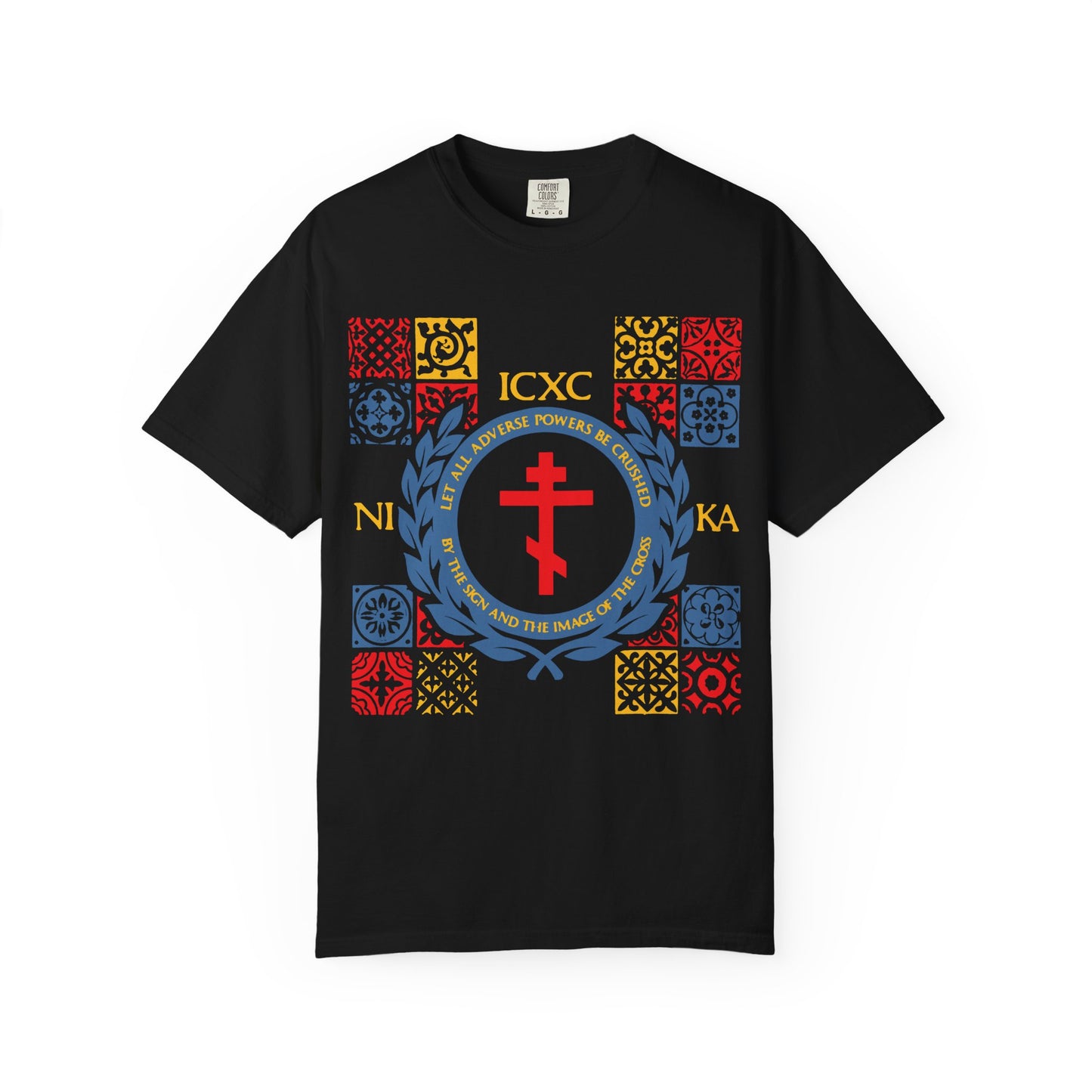 Let All Adverse Powers Be Crushed heavyweight black cotton unisex t-shirt featuring a vibrant red, yellow, and blue medieval tile design with the prominent ICXC NIKA cross symbol and English-Greek religious text inspired by Katavasia hymns on the front.