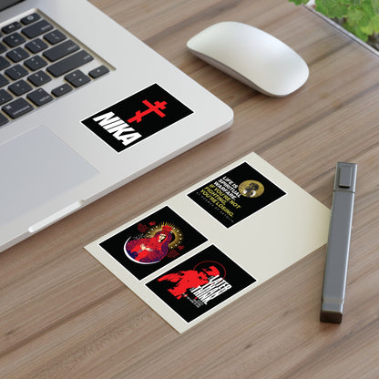 A laptop with Bestseller Orthodox Sticker Mix No. 5 and religious cards on a desk, plus a mouse and pen.