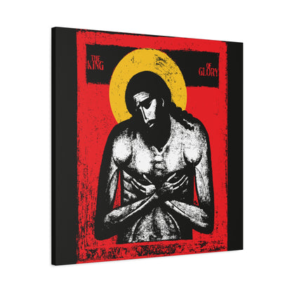 The King of Glory Jesus Christ "Extreme Humility" IconoGraphic—red, yellow, white & black Christian wall art with stylized Jesus, halo, arms crossed on red background and "The King of Glory" text, inspired by Isaiah 53.