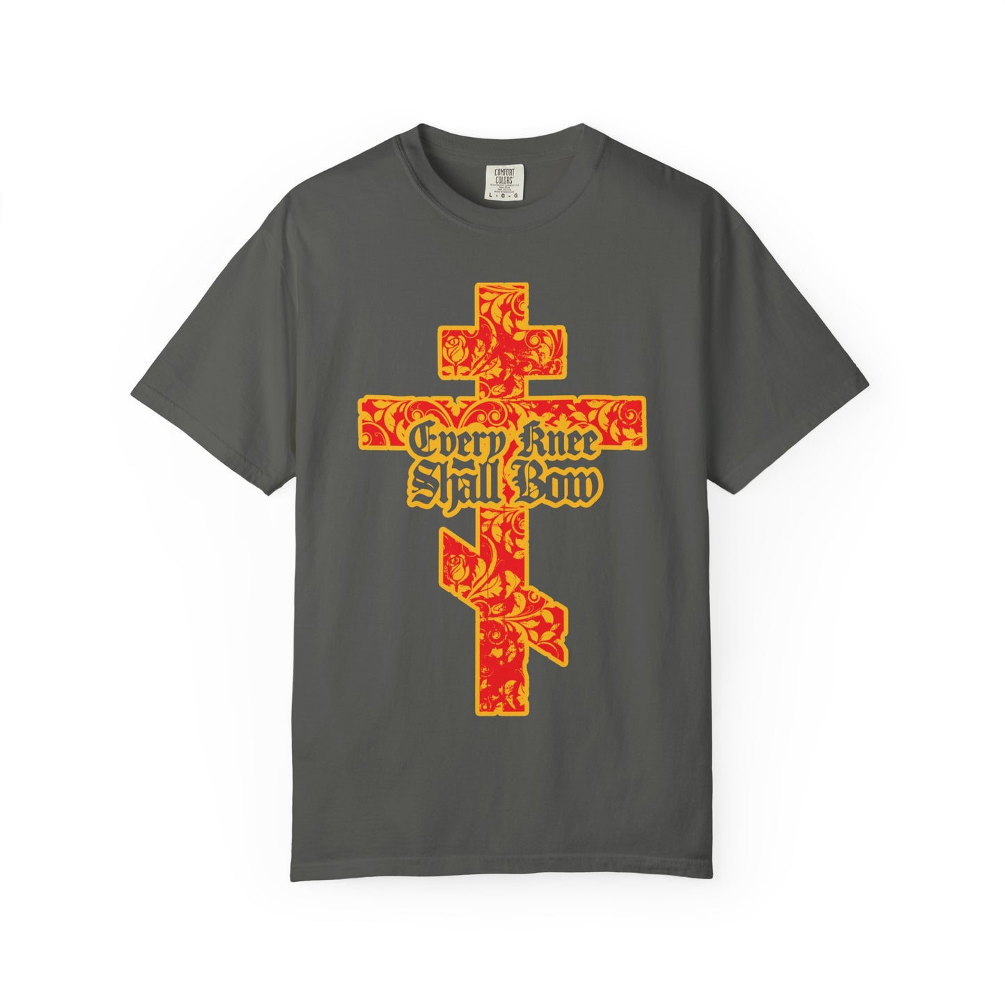 Pepper-colored heavyweight cotton unisex tee featuring a gold and red floral texture Orthodox cross with gothic lettering and the words “Every Knee Shall Bow” on the front, inspired by Isaiah 45:22-24 and Philippians 2:7-11.