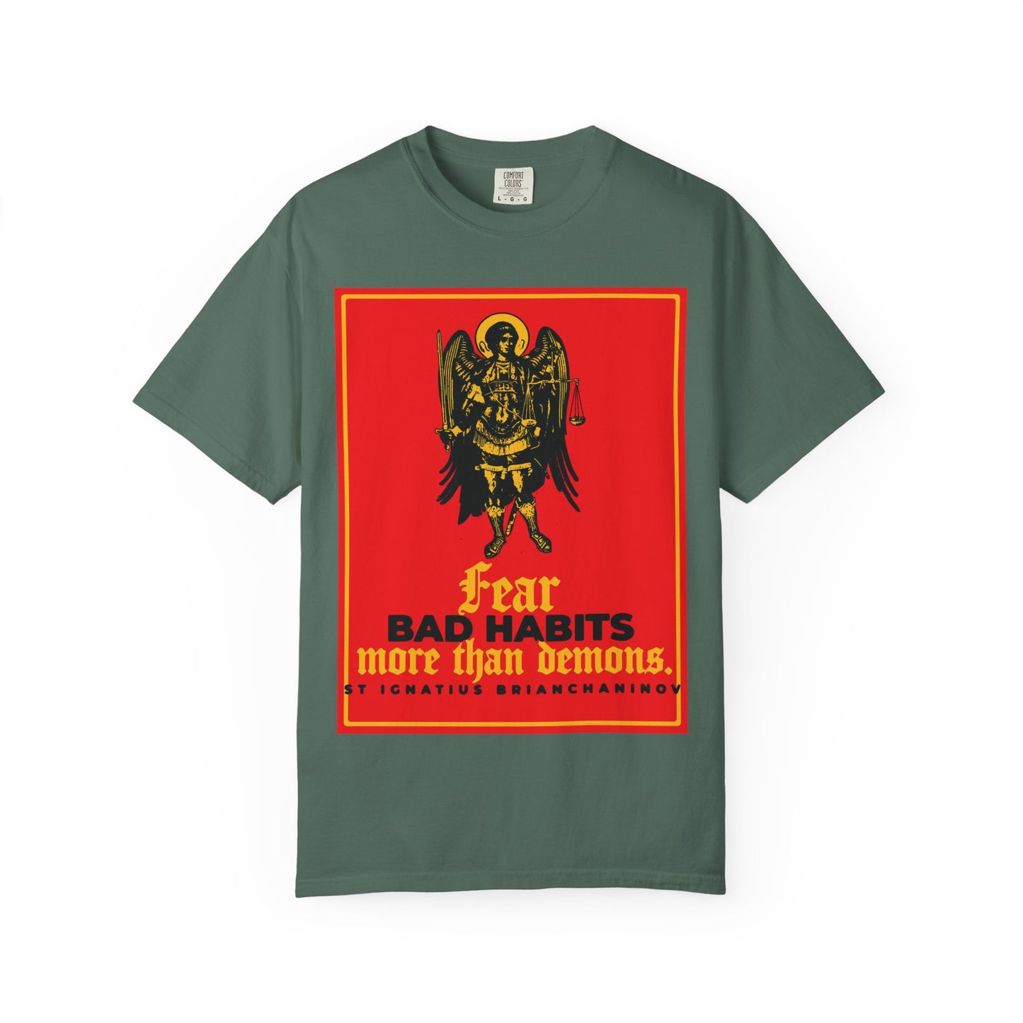 Blue Spruce heavyweight cotton unisex tee featuring an iconographic image of Archangel Michael and the quote from St Ignatius Brianchaninov: Fear bad habits more than demons—a reminder that true moral freedom comes from overcoming inner struggles.