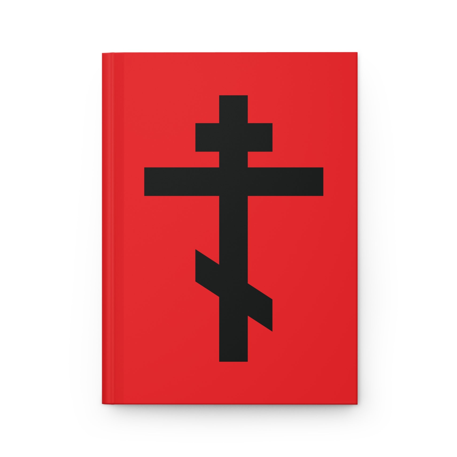 A red hardcover journal featuring a large black Orthodox cross and the quote "May I never boast, except in the cross of our Lord Jesus Christ" (Gal 6:14) on the cover.