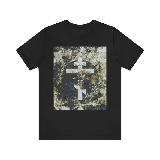 Black "Behold, I Make All Things New" tee features a cosmic textured Orthodox cross and text from Revelation 21:5—a unique Christian gift. Lightweight cotton unisex shirt in black, inspired by new creation and Parousia.