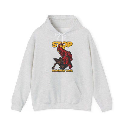 Gray hoodie with red, blue, and yellow graphic of St Marina of Antioch beating the devil with a hammer, text "Stop, Hammer Time"—a modern Orthodox meme and tribute to the 4th-century Christian martyr.