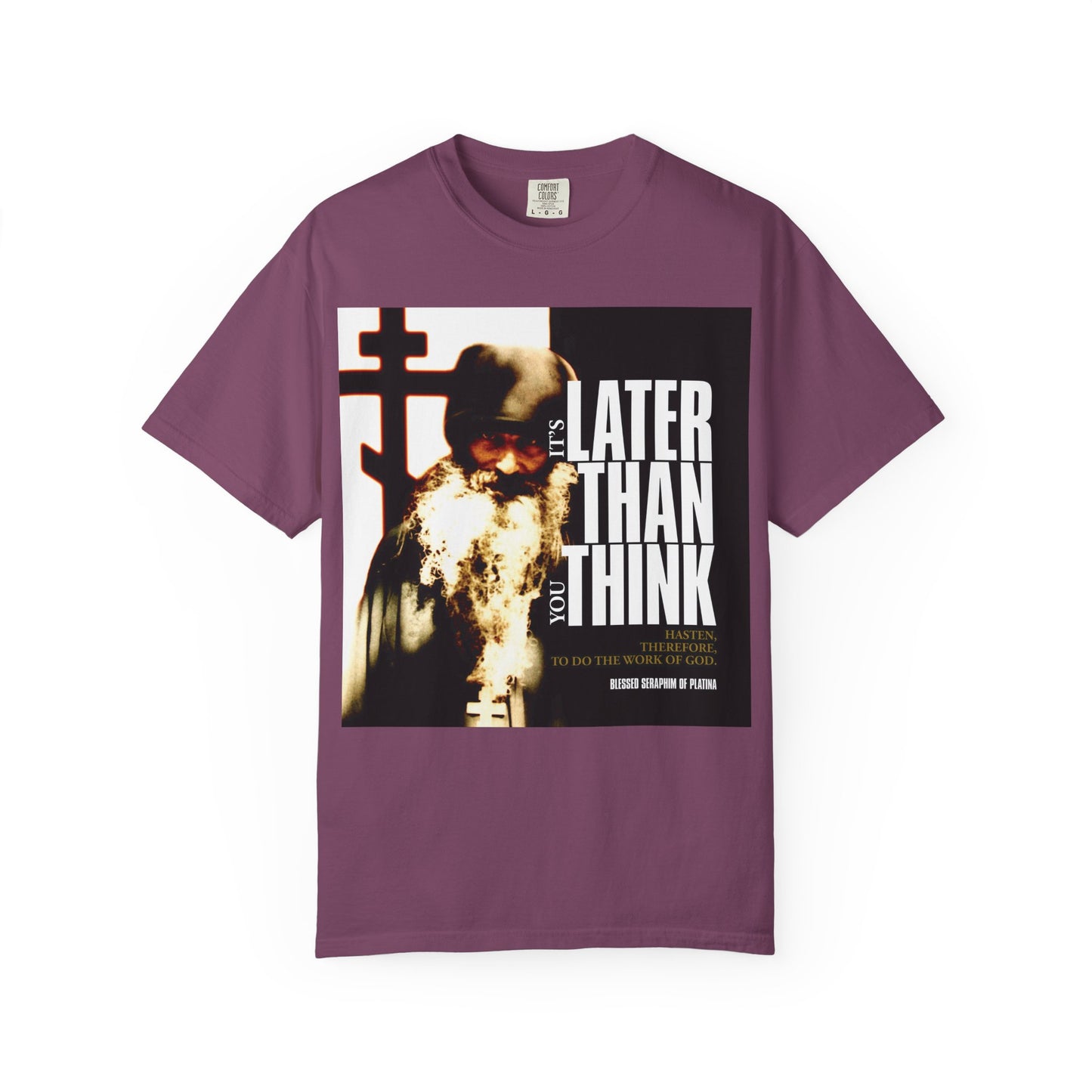 Berry-colored heavyweight cotton unisex T-shirt with a photo of Fr Seraphim Rose and "It's Later Than You Think" in modern cinematic poster typography—a reminder to reflect and stay centered on God.