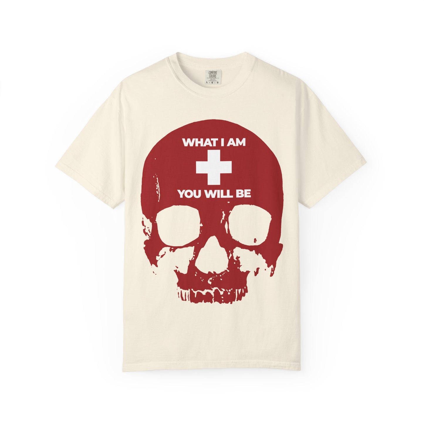 Ivory heavyweight cotton unisex tee featuring a bold red skull with a prominent white cross and the phrase "What I Am You Will Be"—a powerful memento mori message inspired by Orthodox Christian tradition and the timeless teachings of Ecclesiastes.