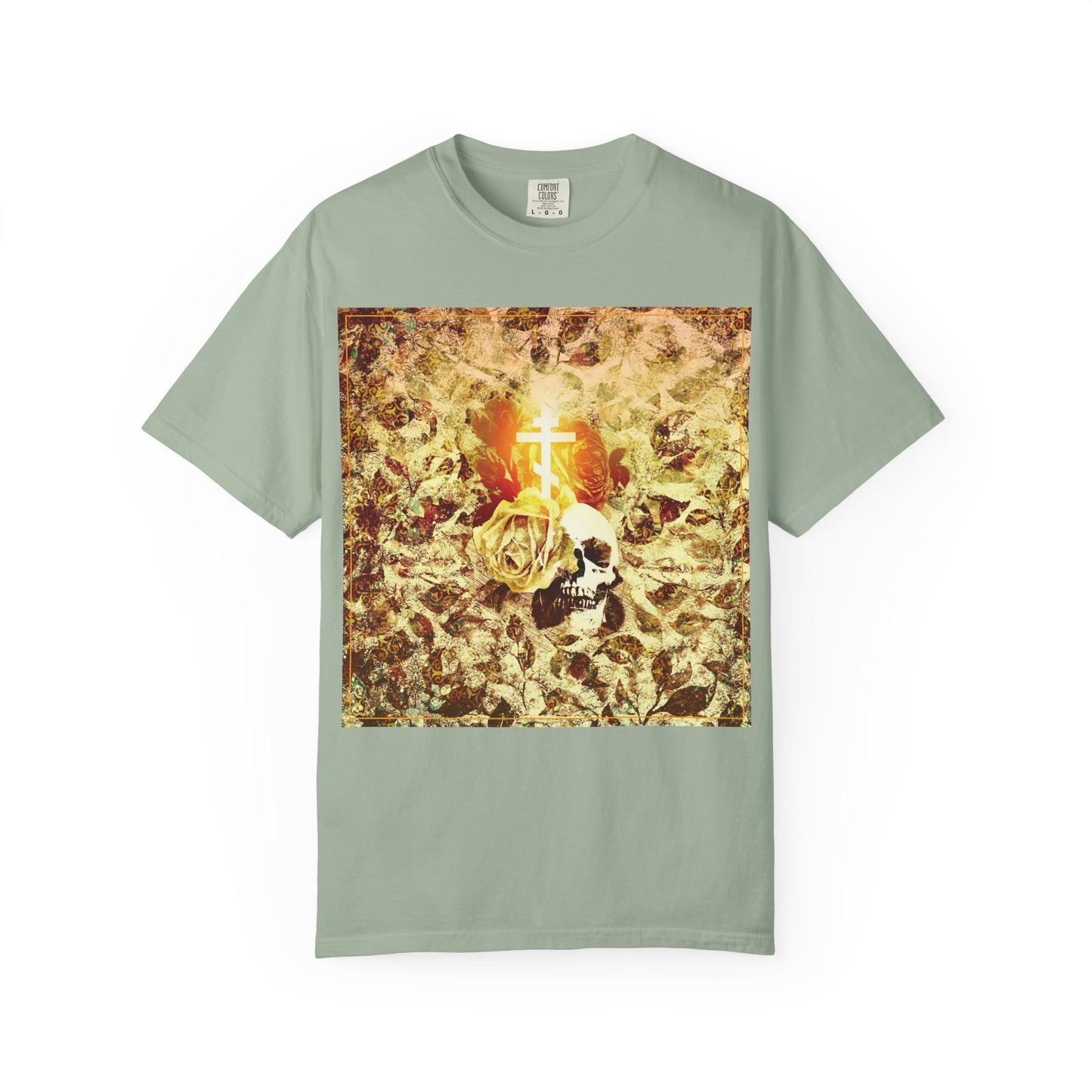 Bay “Rose & Skull Glowing Orthodox Cross” heavyweight unisex tee featuring a graphic of a skull, rose, glowing orthodox cross, and gold leaves at the center—combining gothic Christian aesthetics with evocative imagery reminiscent of Ezekiel’s valley of dry bones.