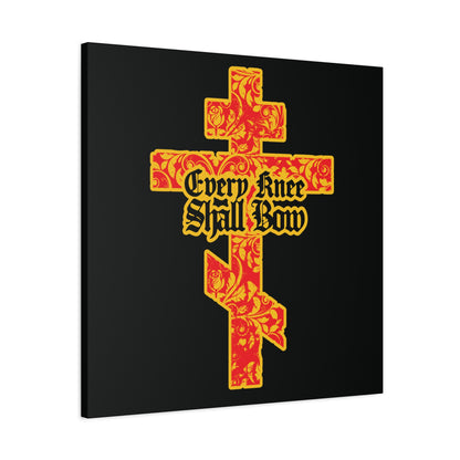 A gold and red floral Orthodox cross with Gothic lettering, featuring "Every Knee Shall Bow" (Isaiah 45:22-24, Phil 2:7-11), displayed on a black background—Christian wall art.