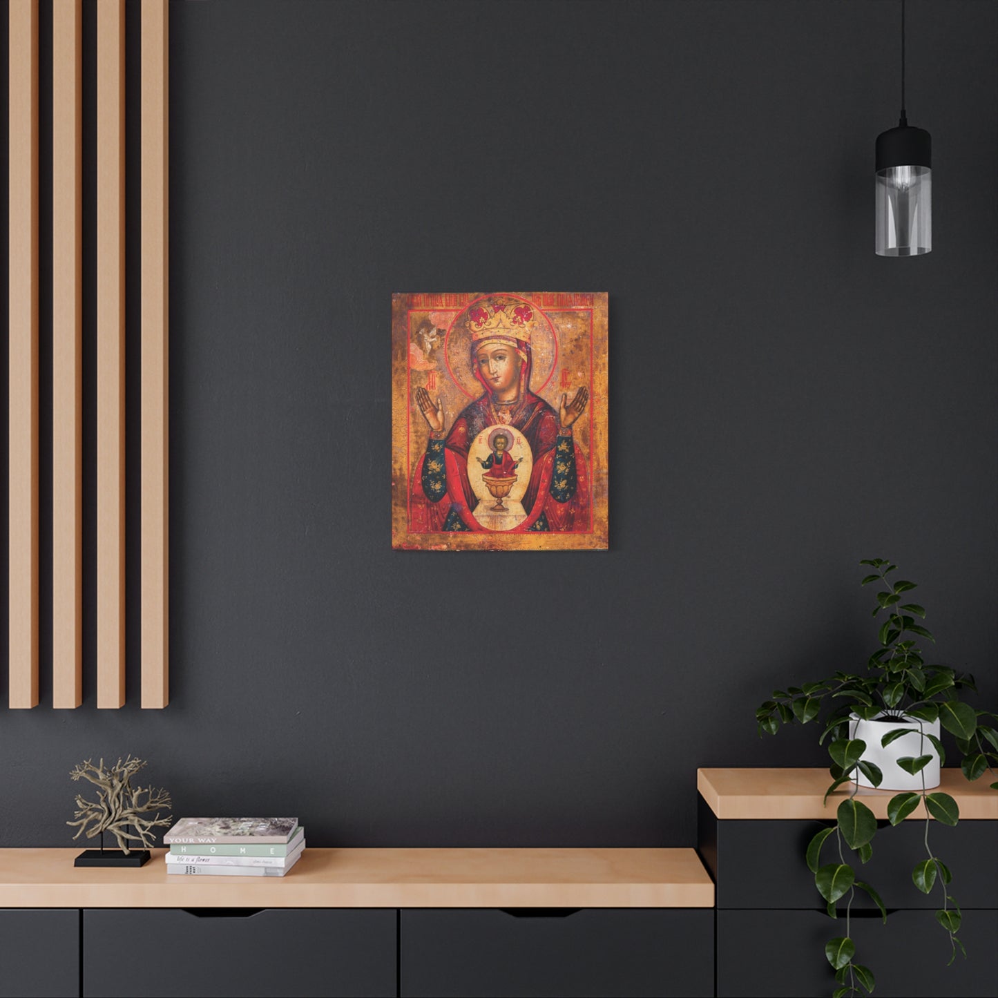 Mother of God of Nicaea Russian Orthodox Christian Icon | Panagia | Theotokos Mary | Religious Canvas Sacred Wall Art hanging on a dark wall above a modern wooden desk decorated with a plant and books.