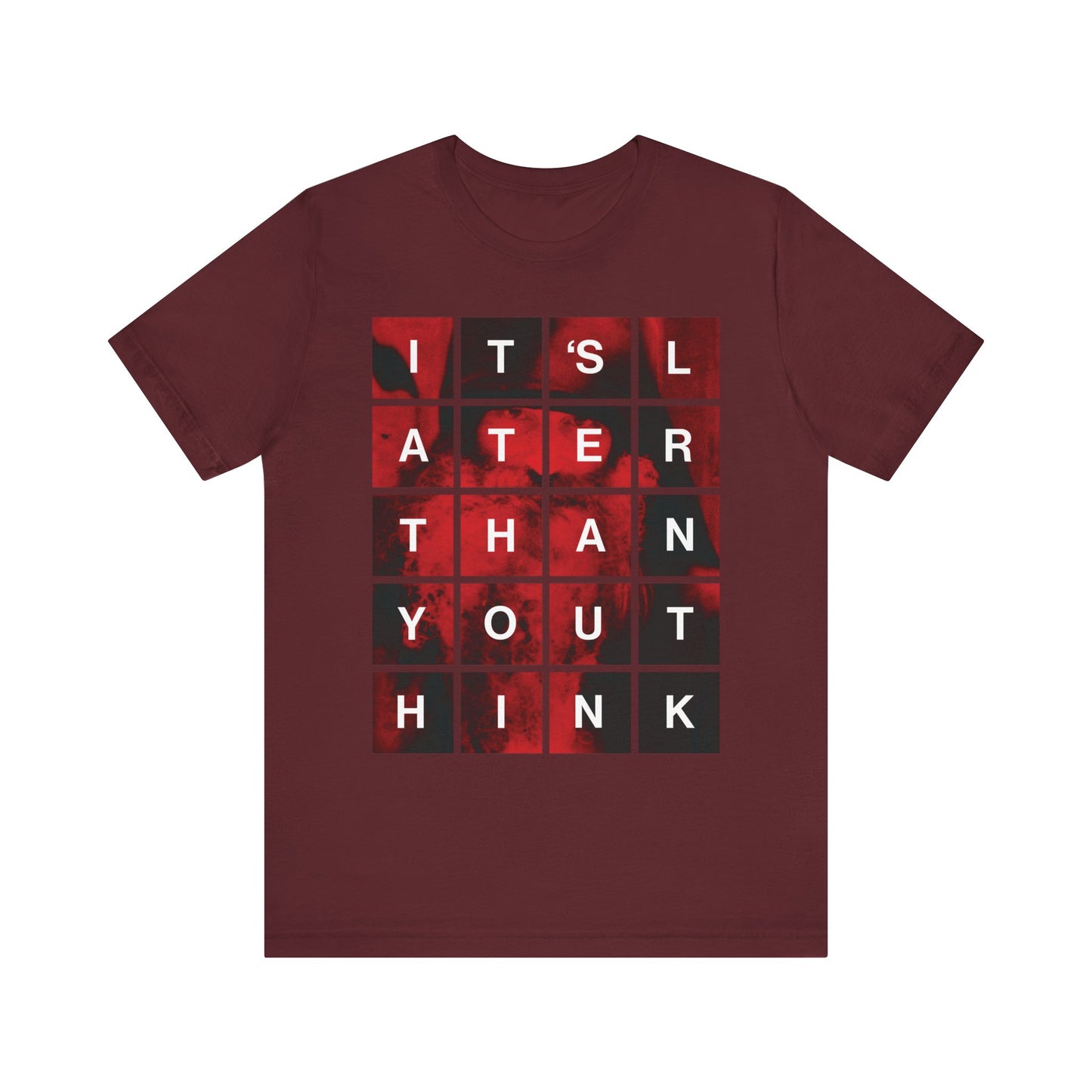 Maroon "It's Later Than You Think" lightweight cotton unisex tee featuring a modern block design with a grid of letters over a red, abstract background—a bold tribute to St Seraphim Rose and the Orthodox Christian message about repentance and the urgency of seeking salvation.