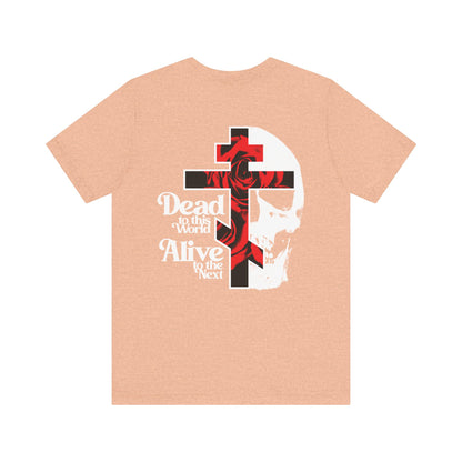 The "Dead to this World" Christian Goth lightweight cotton tee features a back print of a flower cross and skull, with branded front—expressing spiritual renunciation in bold, unisex style.