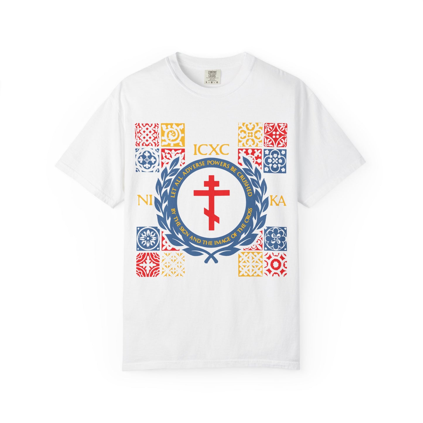 White "Let All Adverse Powers Be Crushed" heavyweight cotton unisex T-shirt featuring a vibrant medieval tile motif in red, yellow, and blue, inspired by Byzantine art and the Red Sea, with a bold red cross framed by a blue laurel wreath (ICXC NIKA) on the front.