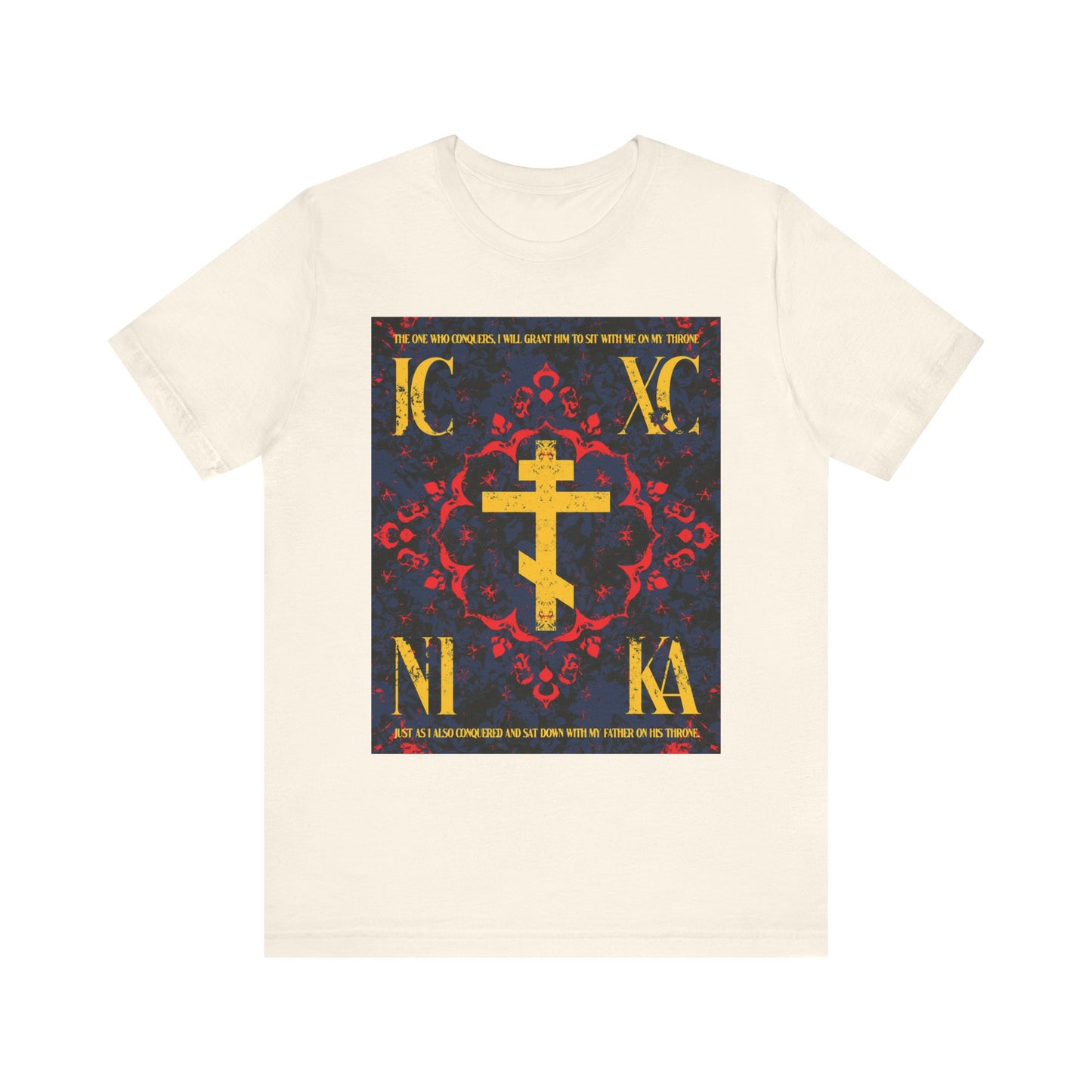 Natural cotton unisex t-shirt featuring the IC XC NIKA Orthodox Cross with a medieval floral design and "The One Who Conquers" from Revelation 3:21, representing victory through faith and grace.