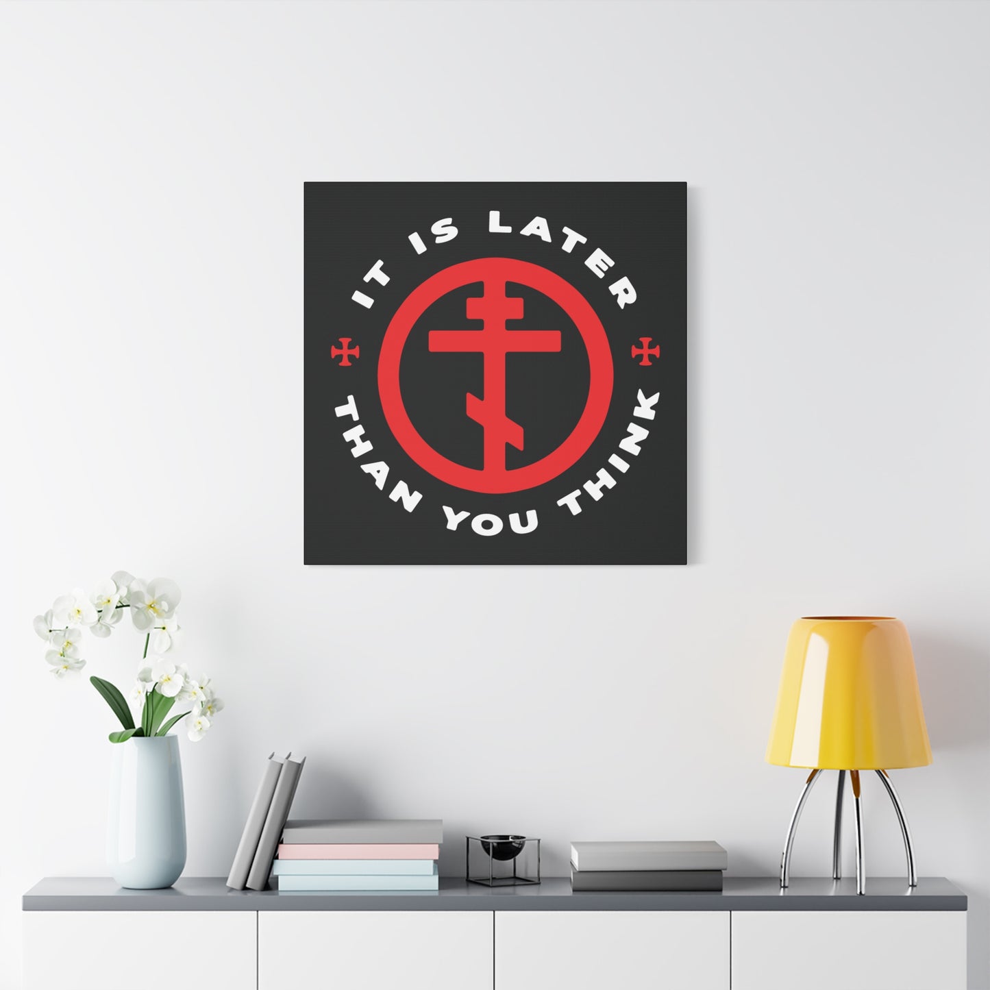 The "It Is Later Than You Think" wall art features an Orthodox cross in a circle and a memento mori theme, inspired by Fr Seraphim Rose, urging viewers to embrace light over darkness.