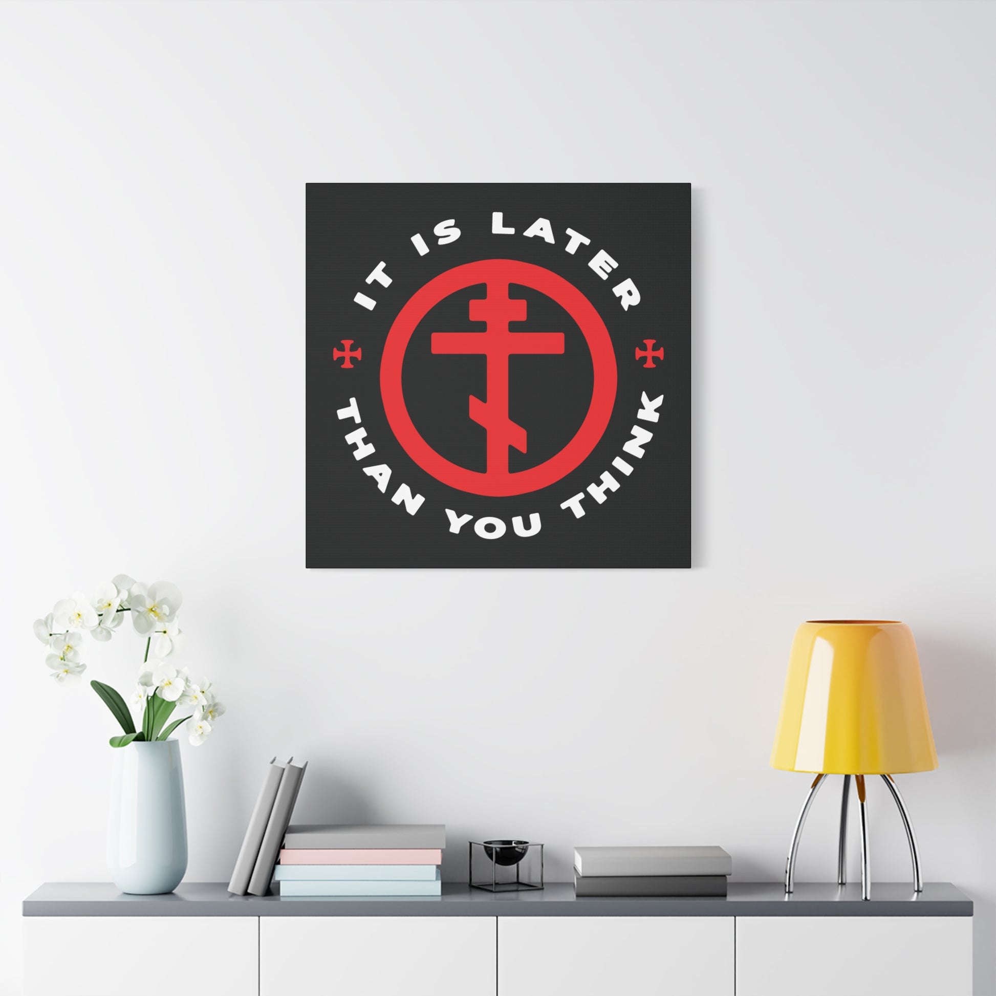 The "It Is Later Than You Think" wall art features an Orthodox cross in a circle and a memento mori theme, inspired by Fr Seraphim Rose, urging viewers to embrace light over darkness.