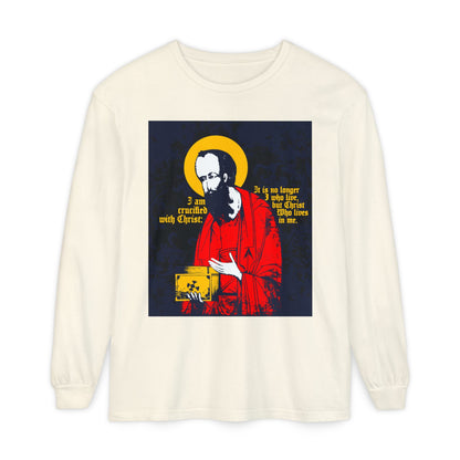 Ivory long-sleeve shirt featuring St. Paul holding the Gospel in iconographic style with "I am crucified with Christ" (Galatians 2:20) in red, yellow, and black—an Orthodox Christian design inspired by new life in Him.