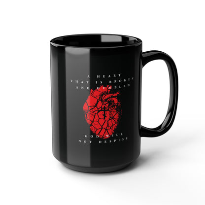 The “A Heart That is Broken and Humbled God Will Not Despise” black mug features a cracked red heart with an Orthodox cross, inspired by Psalm 51—a daily reminder of repentance and a humble spirit.