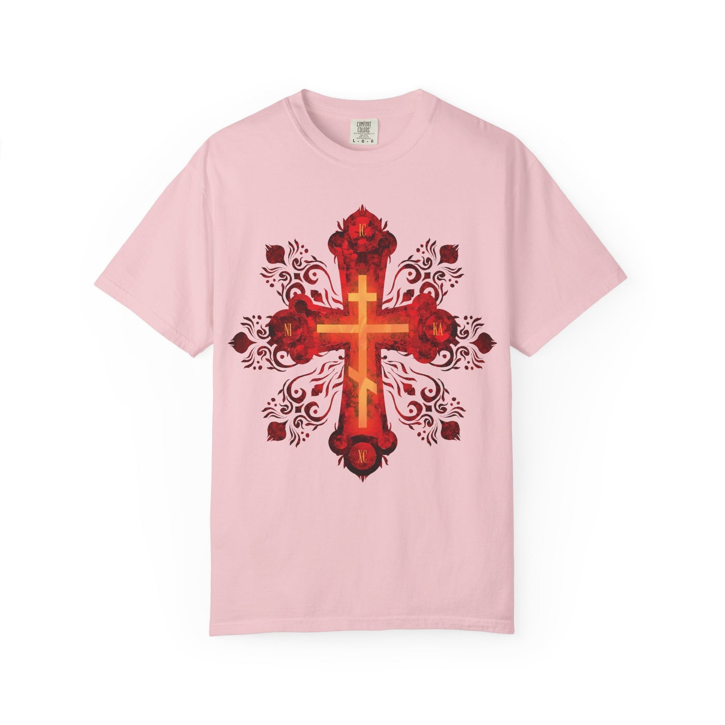 Blossom-hued heavyweight cotton unisex tee featuring a striking red and gold ornate Russian-style Precious & Life-Giving Orthodox Cross, adorned with decorative floral accents and inspired by the devotion to St. Herman of Alaska—bearing the message, “He was pierced for our transgressions.”.