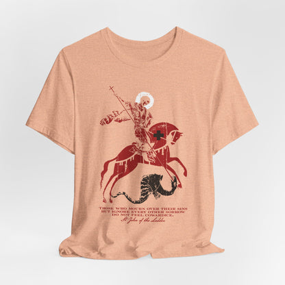 Light brown unisex lightweight cotton tee titled “Those Who Mourn Over Their Sins,” featuring an Orthodox Christian iconographic design of St. George slaying the dragon with accompanying text, inspired by St. John Climacus’s teaching on godly sorrow and mourning for one’s sins.